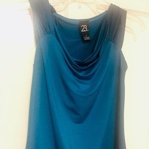 23rd St. teal sleeveless top with a scoop neck.